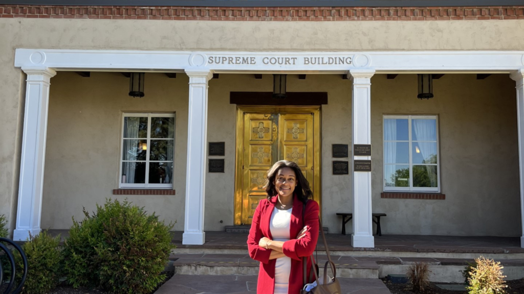 Alexis Jones poses outside the New Mexico Supreme Court, where she spent her summer clerking.