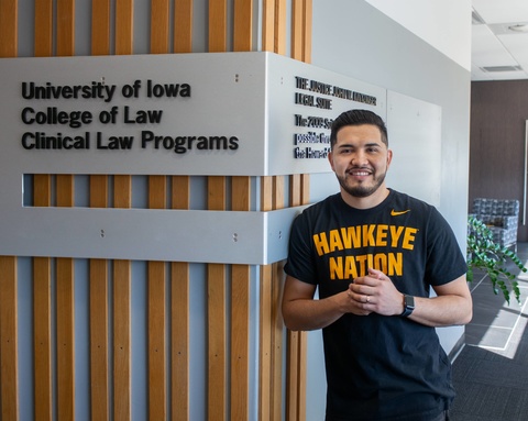 Eddie Ponce, Class of 2021, standing outside of the Law Clinics at Iowa Law