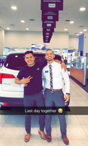 Eddie Ponce, Class of 2021, at a car dealership before leaving for law school