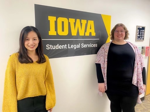 Yutian Lei and Alison Leuchtenmacher pose in the UI Student Legal Services office