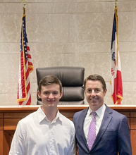 1L Justin Rempe pictured with Justice McDermott of the Iowa Supreme Court.