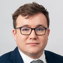 Kyle Estel posing for a headshot