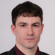 Daniel Hackbarth, posing for a headshot.