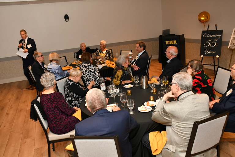Alumni celebrating a milestone anniversary gather for dinner.