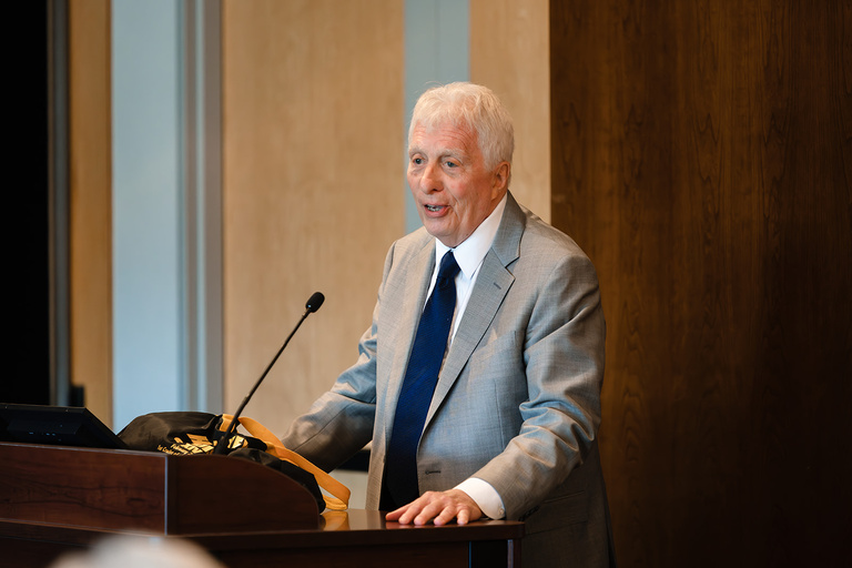 Retired Judge Jon Fister speaks during the College of Law Investiture Ceremony