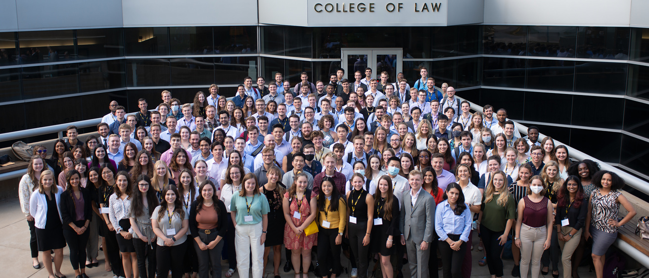 Class of 2024 group photo outside the Boyd Law Building