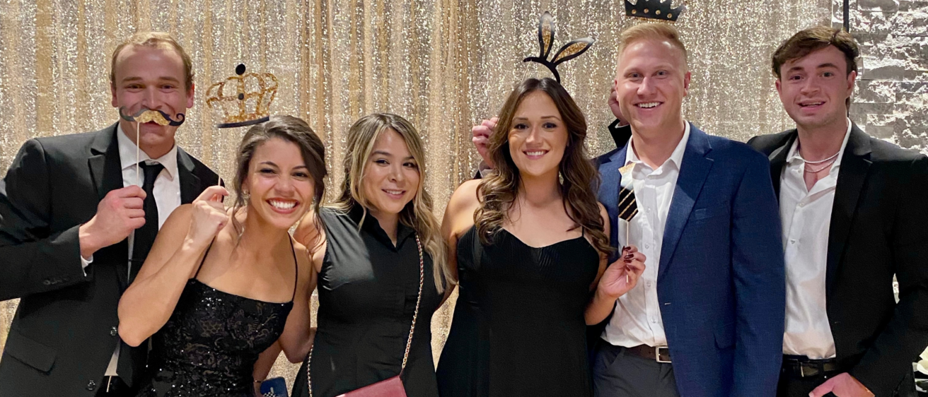 A group of students at the 2022 annual law school auction hosted by EJF