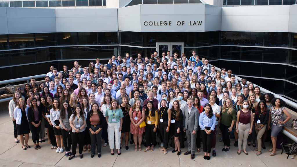 Class of 2024 group photo outside the Boyd Law Building