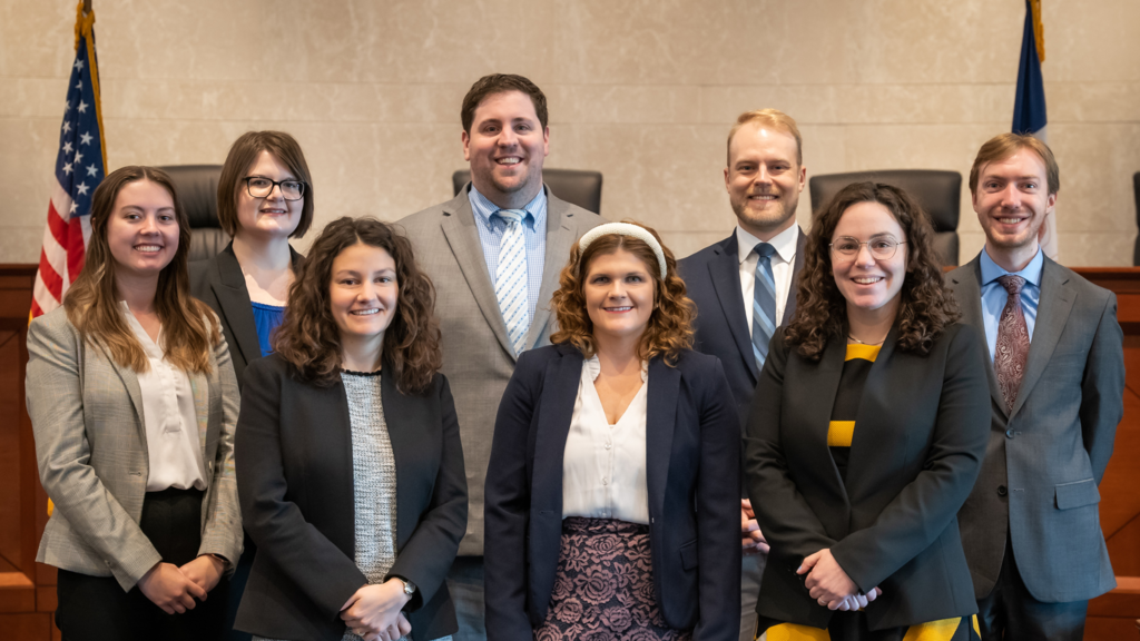 A group photo of the seven alumni clerks for the Iowa Supreme Court.