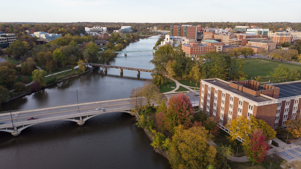 An aerial view of the Iowa River with multiple bridges.