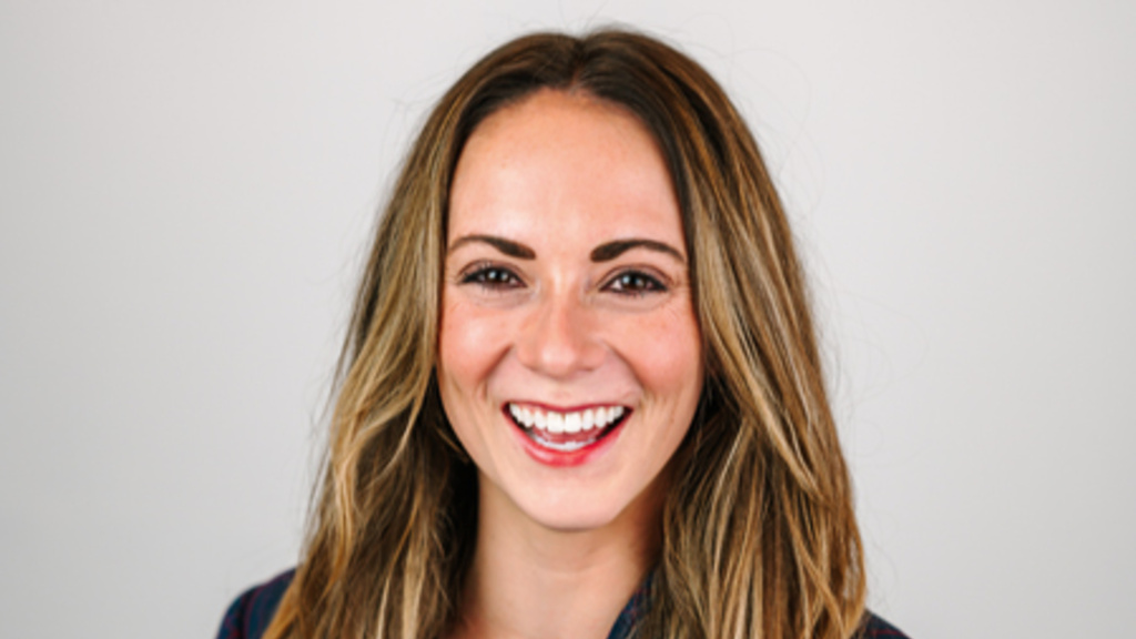 Mackensie Graham, posing for a photo.