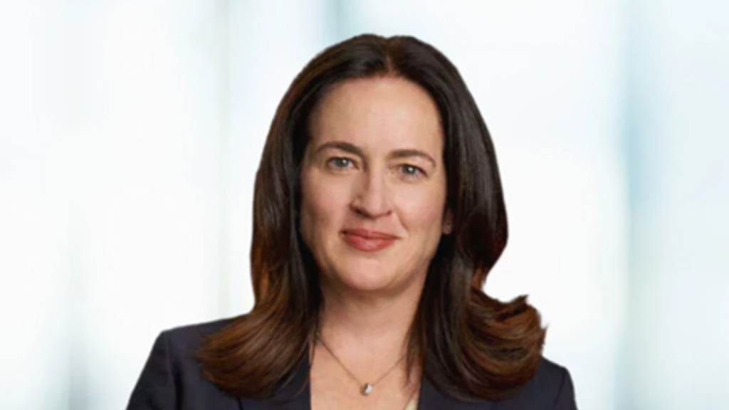 Tara Sutton, posing for a photo